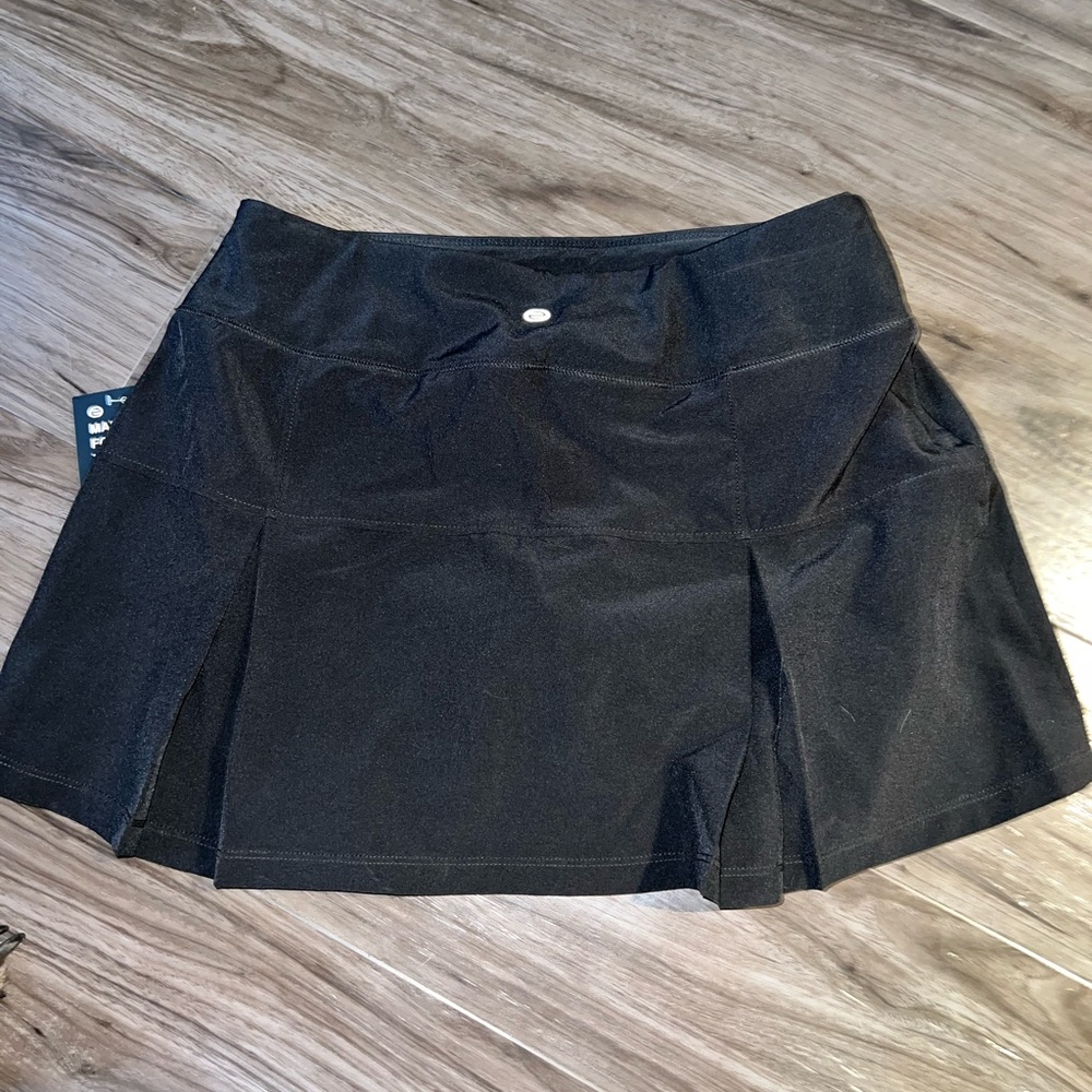 Black tennis skirt. New with tags.